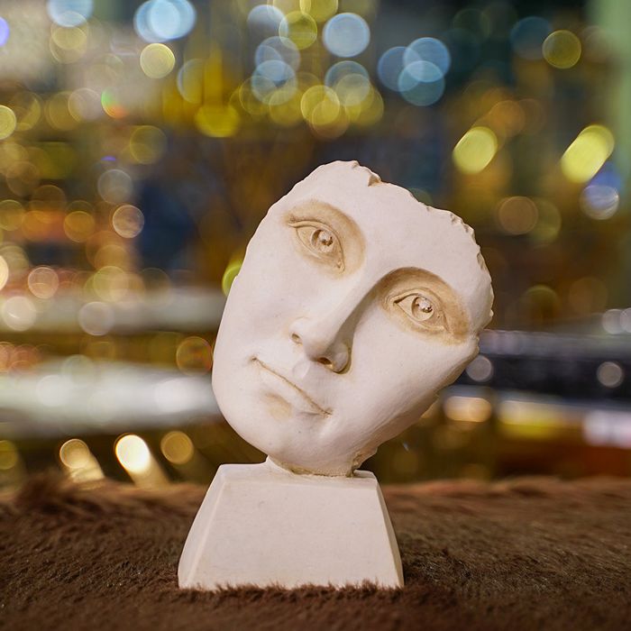 Sad Face Ceramic Statue